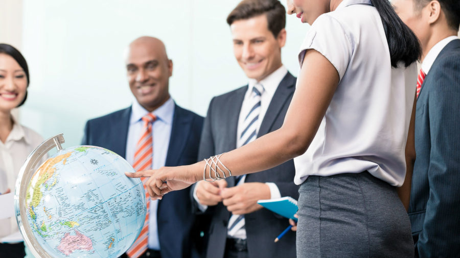 Office people looking at global strategy