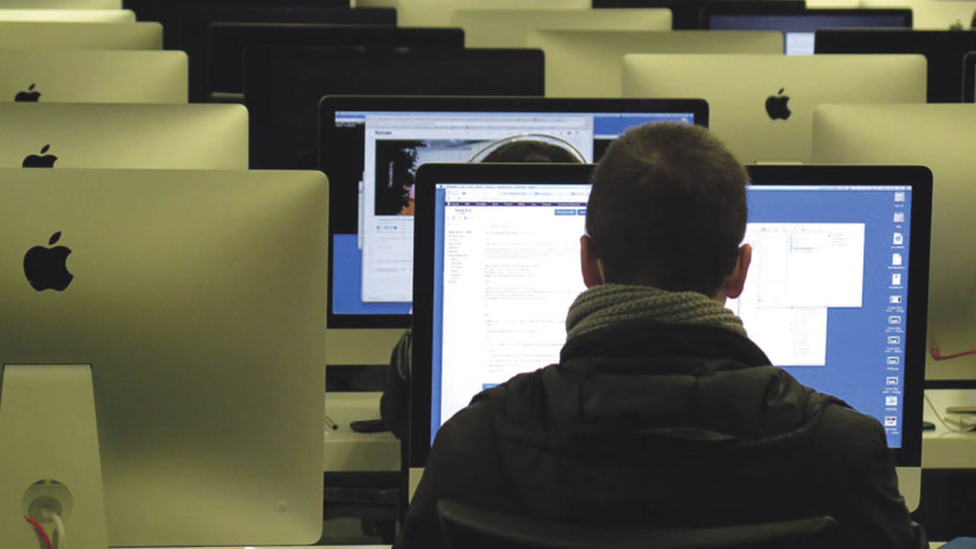 Man sitting in front of computer