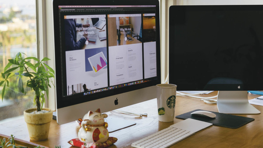 Monitor showing website design