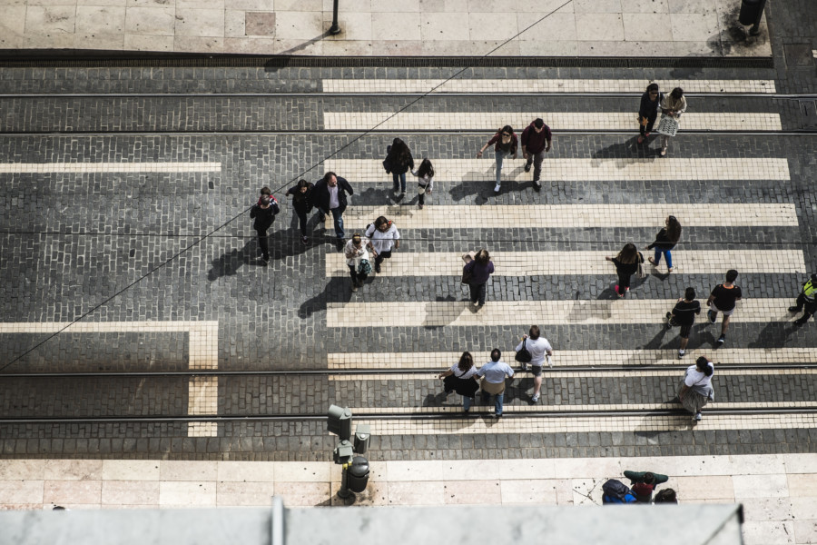 Pedestrians crossing road aerial view
