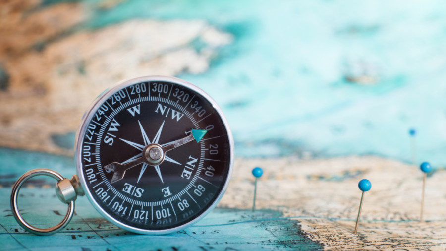 Compass on map
