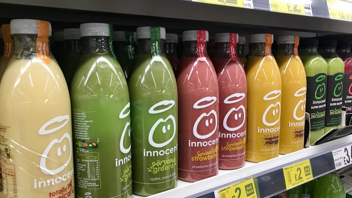 Bottles of innocent smoothies on a supermarket shelf