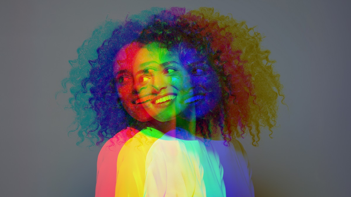 Multiple exposure,dark skinned female smiling